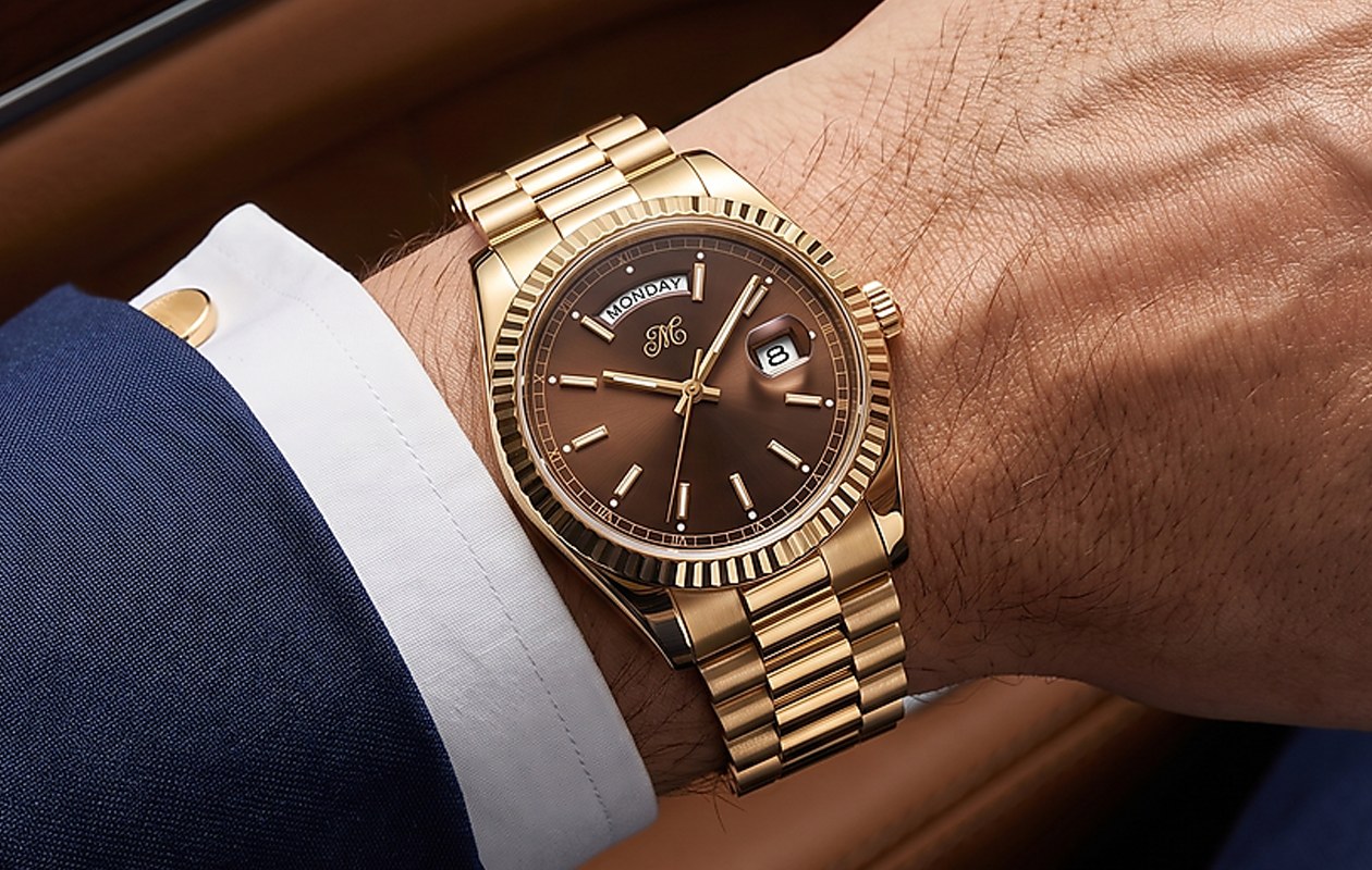 Laurent 05 gold day-date watch with brown dial worn on the wrist